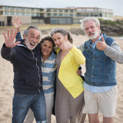 Seniors grouped together giving thumbs up